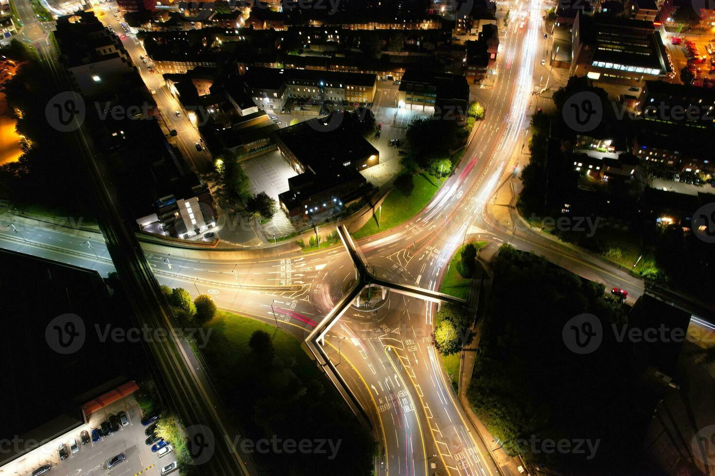 Aerial View of Illuminated Downtown Buildings, Roads and Central Luton City of England UK at Beginning of Clear Weather Night of September 5th, 2023 photo