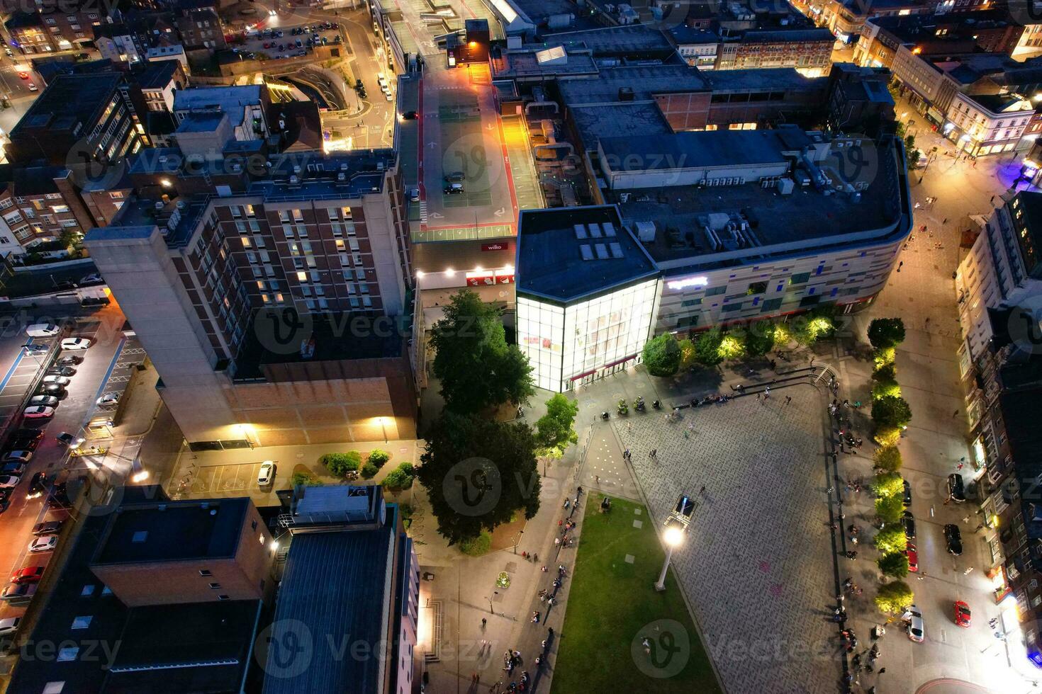 Aerial View of Illuminated Downtown Buildings, Roads and Central Luton City of England UK at Beginning of Clear Weather Night of September 5th, 2023 photo