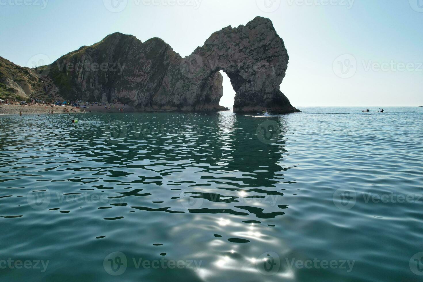 Most Beautiful High Angle View of British Landscape and Sea View of Durdle Door Beach of England Great Britain, UK. Image Was captured with Drone's camera on September 9th, 2023 photo