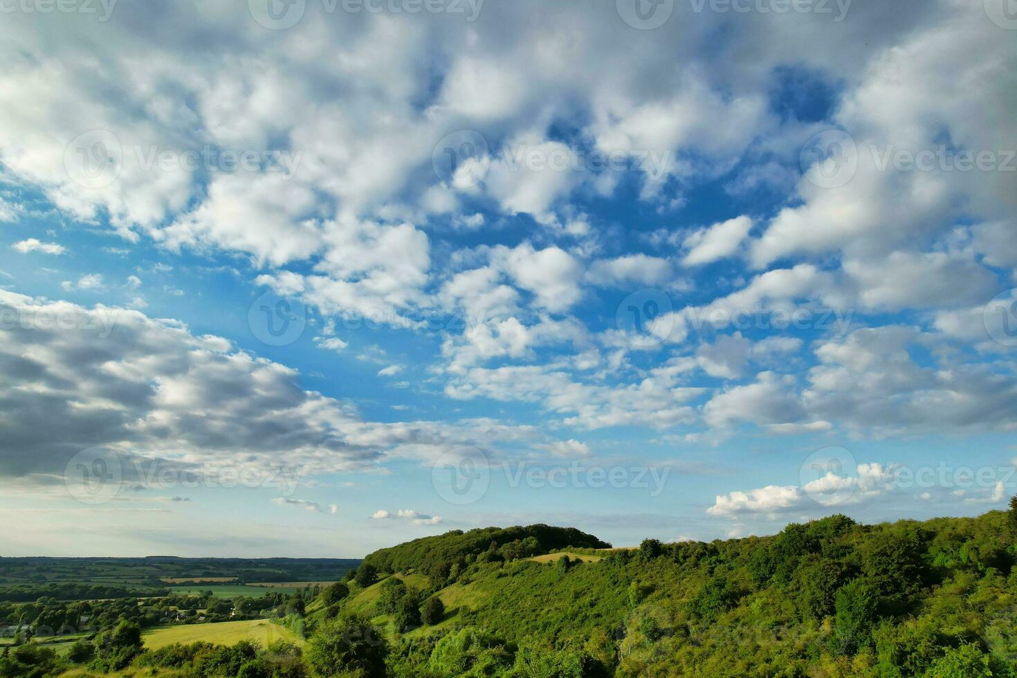 High Angle Footage of British Agricultural Farms at Countryside Landscape Nearby Luton City of England Great Britain of UK. Footage Was Captured with Drone's Camera photo