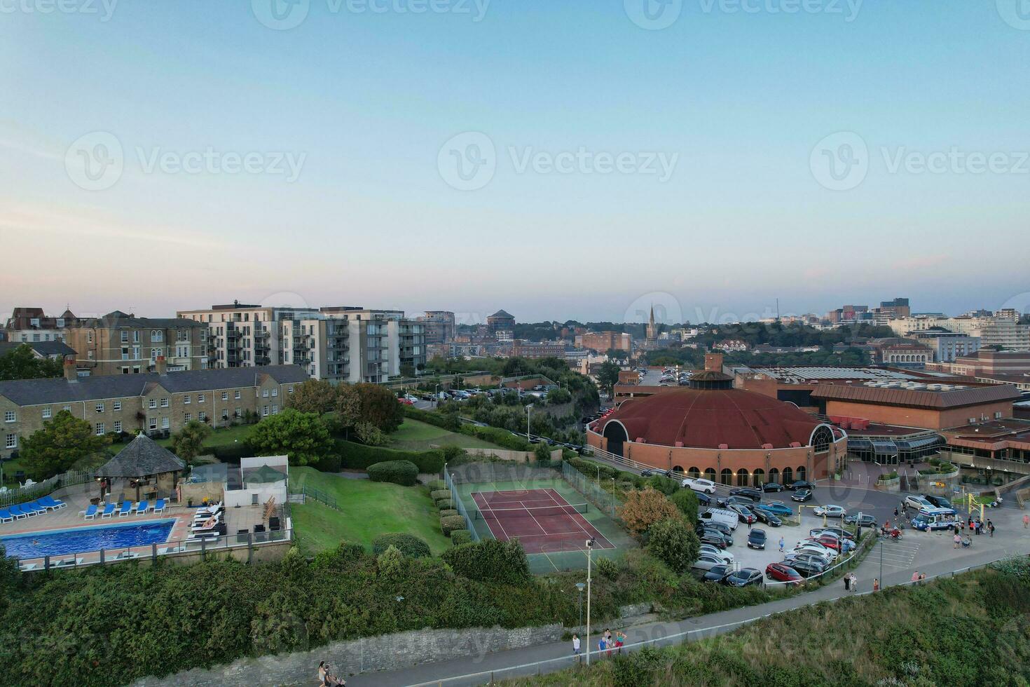 Beautiful Aerial Footage of British Tourist Attraction at Sea View of Bournemouth City of England Great Britain UK. High Angle Image Captured with Drone's Camera on September 9th, 2023 During Sunset photo