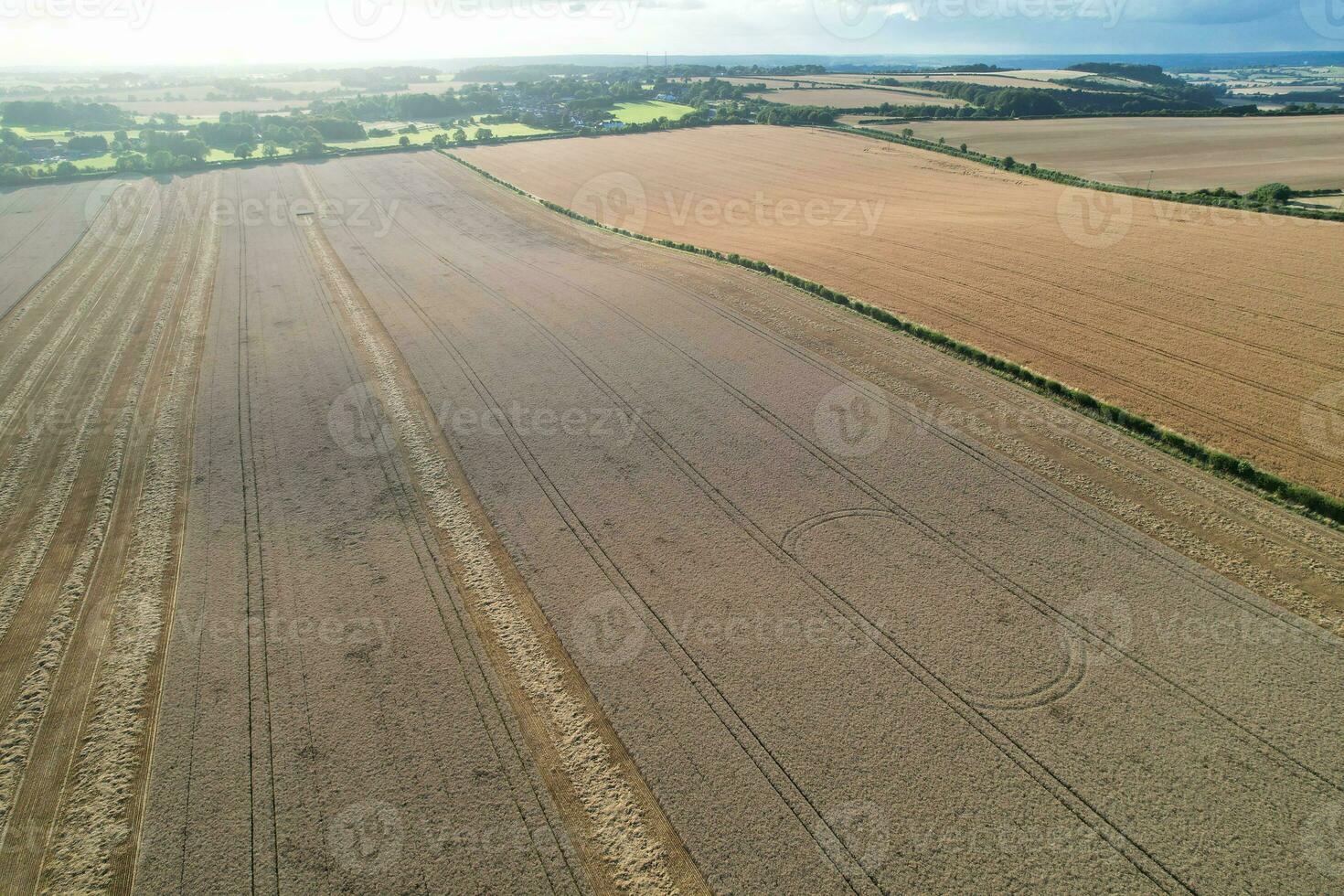 High Angle Footage of British Agricultural Farms at Countryside Landscape Nearby Luton City of England Great Britain of UK. Footage Was Captured with Drone's Camera on August 19th, 2023 photo