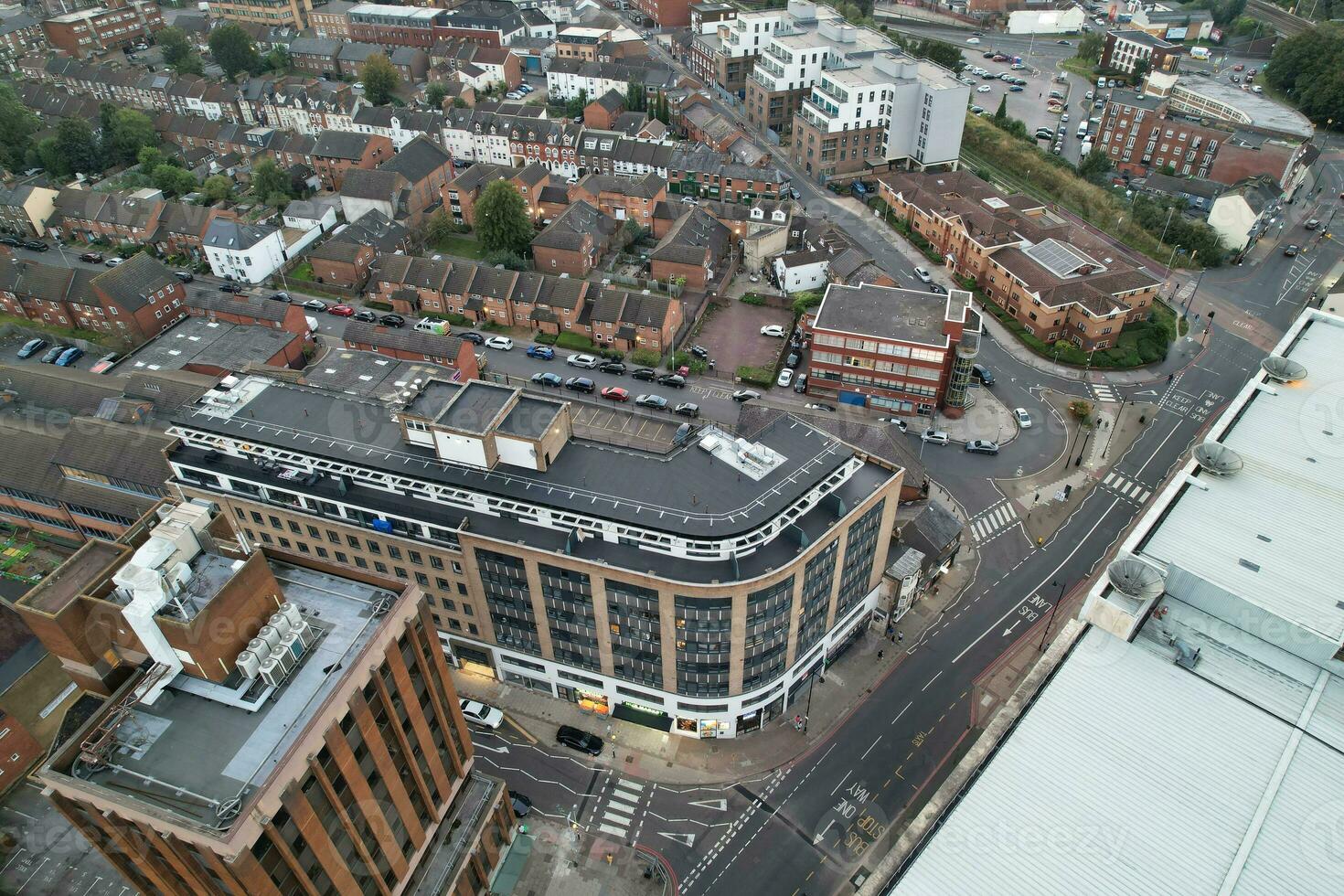 Aerial View of Illuminated Downtown Buildings, Roads and Central Luton City of England UK at Beginning of Clear Weather Night of September 5th, 2023 photo