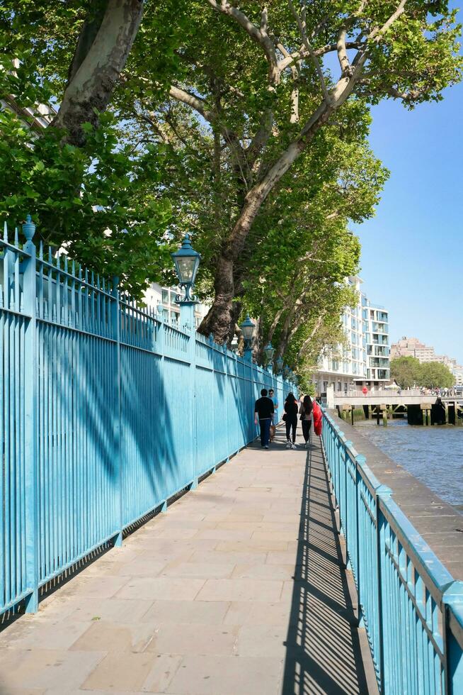Best View of Boat over River Thames Waters at London Bridge, Capital City of England Great Britain. The Image Was Captured June 4th, 2023 photo