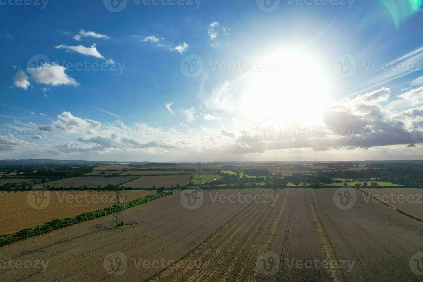 High Angle Footage of British Agricultural Farms at Countryside Landscape Nearby Luton City of England Great Britain of UK. Footage Was Captured with Drone's Camera on August 19th, 2023 photo