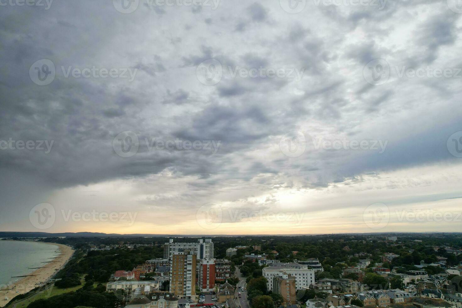 Ariel Footage of Attractive Tourist Destination at Bournemouth City Sandy Beach and Ocean of England Great Britain, Aerial Footage Captured with Drone's Camera on August 23rd, 2023 During sunny Day. photo