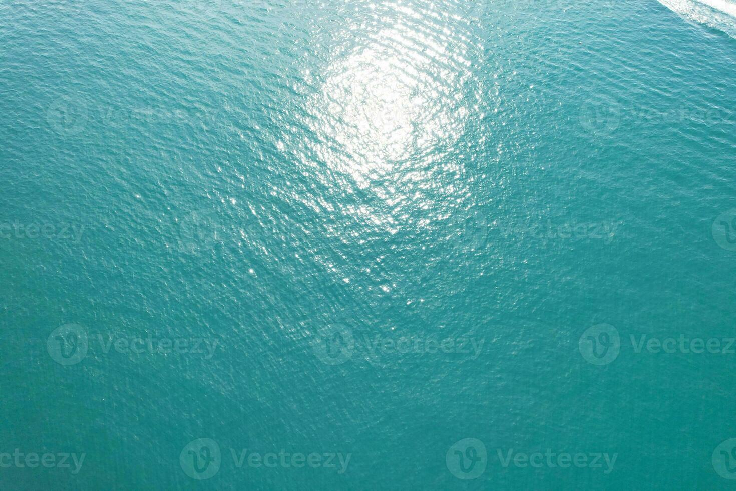 Most Beautiful View of British Landscape and Sea View of Durdle Door Beach of England Great Britain, UK. Image Was captured with Drone's camera on September 9th, 2023 photo