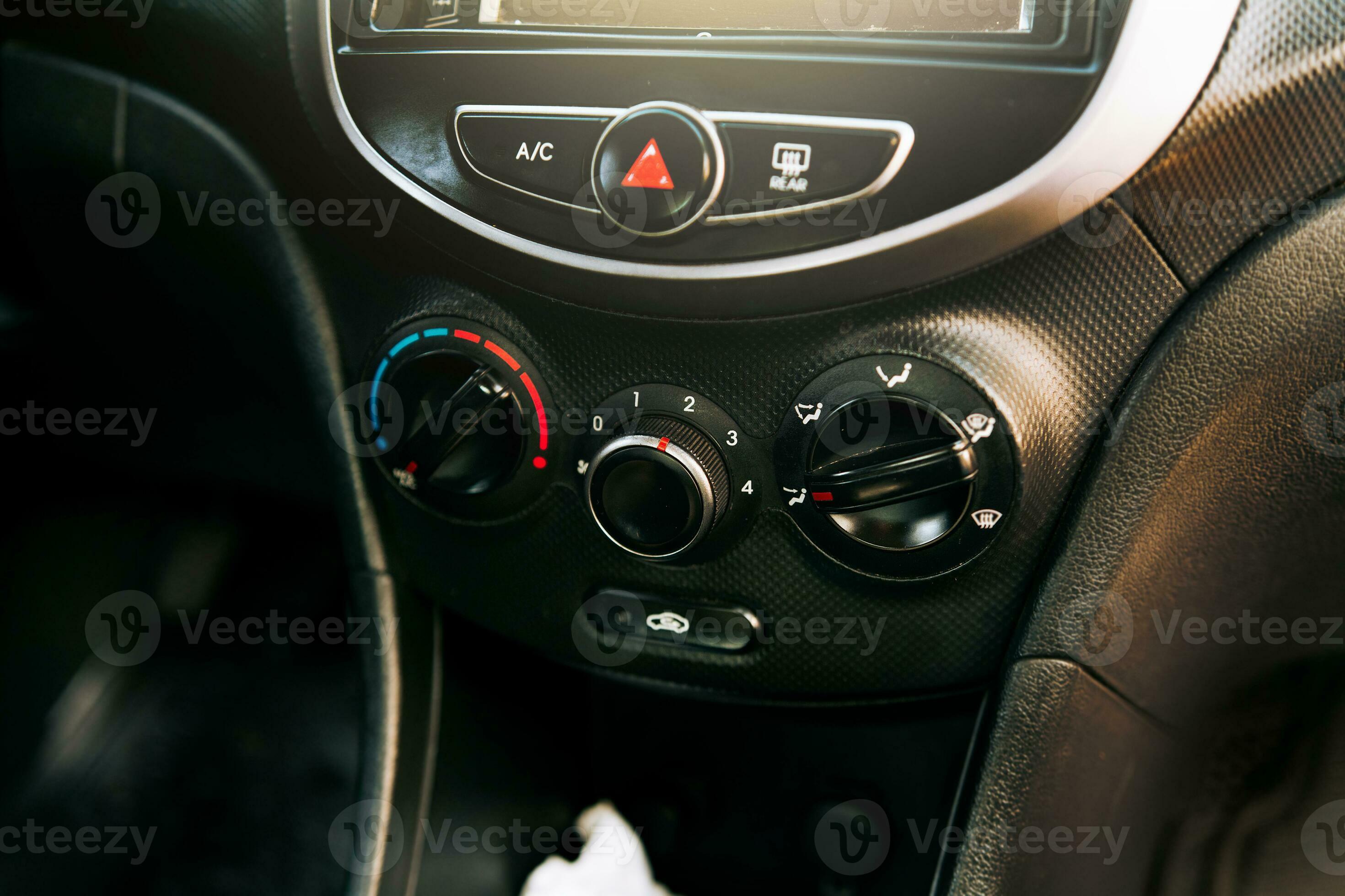 Front view of a car air conditioning control panel. Close up of