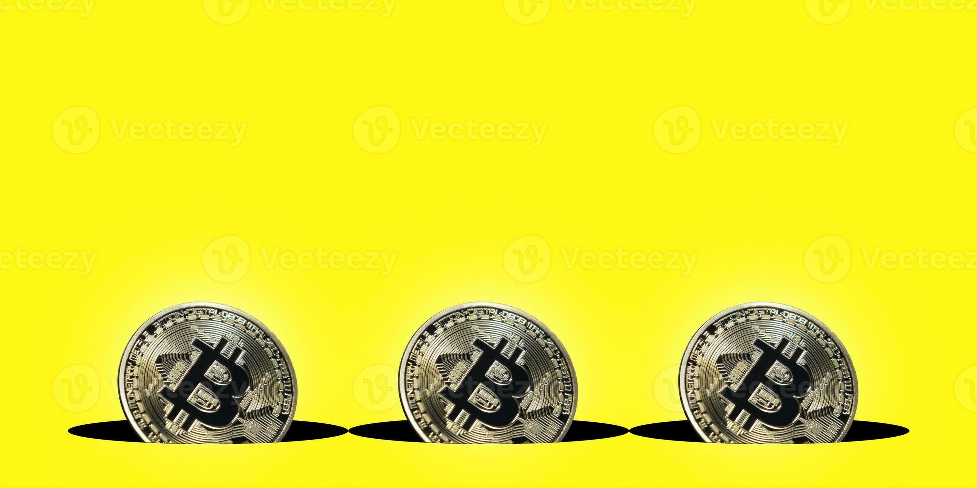 Virtual cryptocurrency concept, bitcoin gold coin on yellow background with copy space, bitcoin gold coin photo