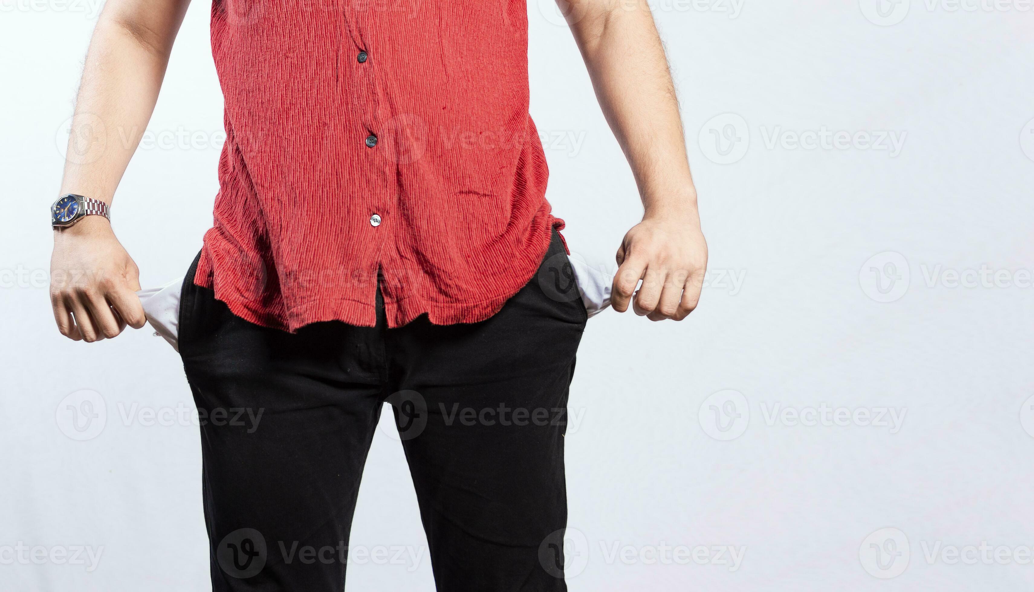 Concept of a man without money, man showing his empty pockets, close up