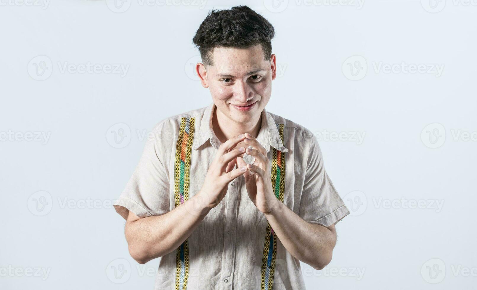 Cunning man rubbing his hands on isolated background, person rubbing his hands planning something, concept of cunning man planning something photo