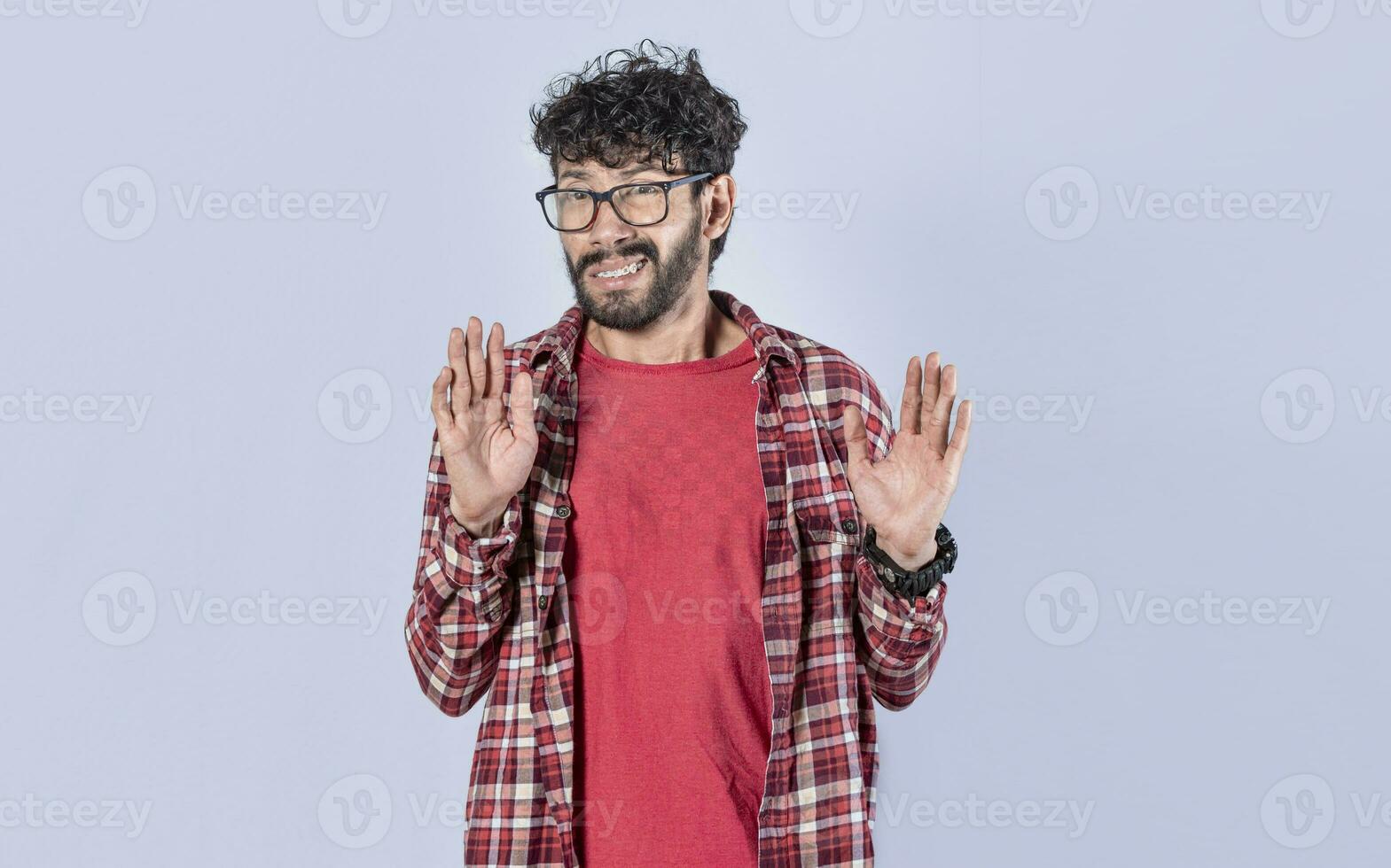 Person with denial expression moving hands. Man with denial expression, man awkwardly refusing photo