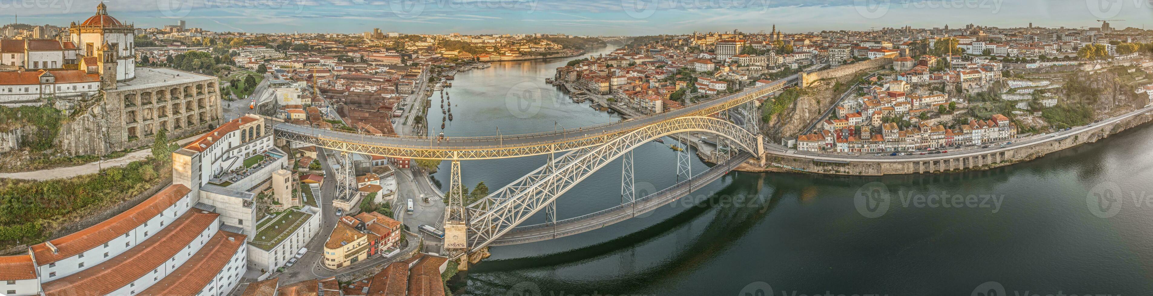 Drone panorama over the city of Porto and the Douro River at sunrise photo