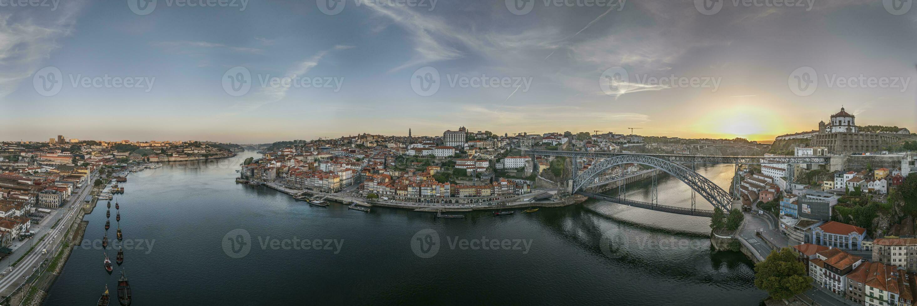 Drone panorama over the city of Porto and the Douro River at sunrise photo