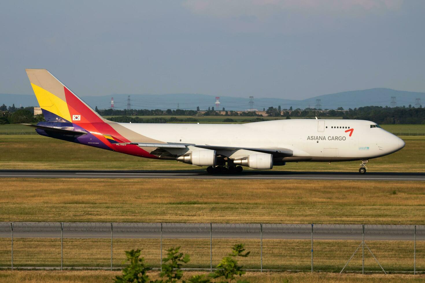 Asiana Cargo Boeing 747-400 HL7620 cargo plane arrival and landing at Vienna Airport photo