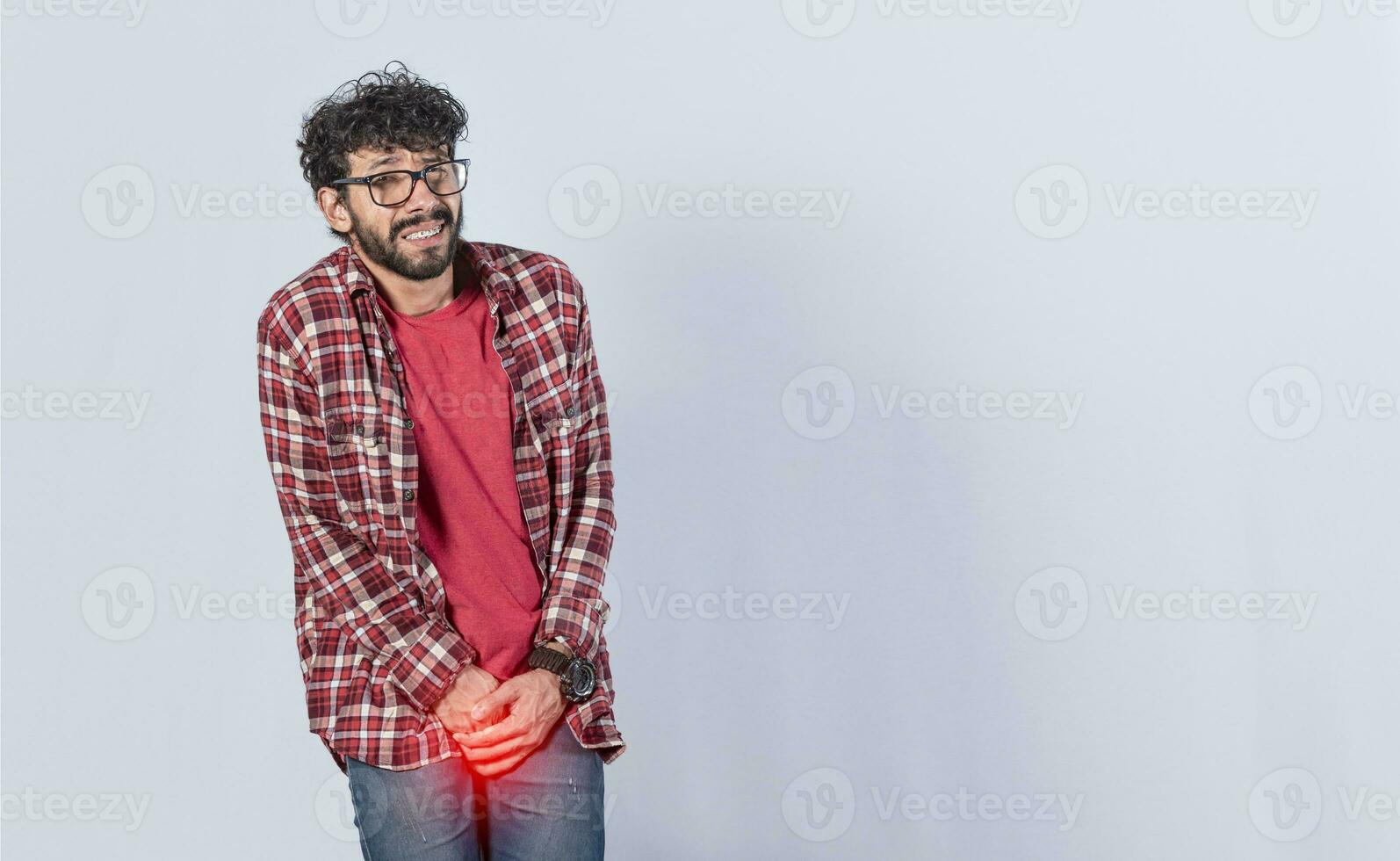 Medical problem, urinary incontinence concept. young man with crotch pain, man with diarrhea problem photo
