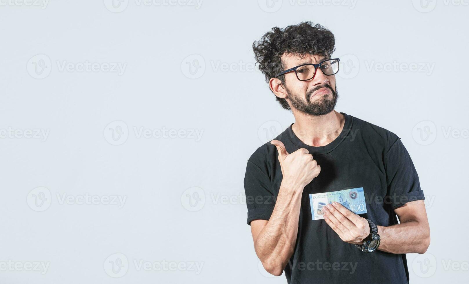 Man holding a banknote with thumb up. Person holding a ticket with thumbs up, People holding a ticket with ok thumb photo