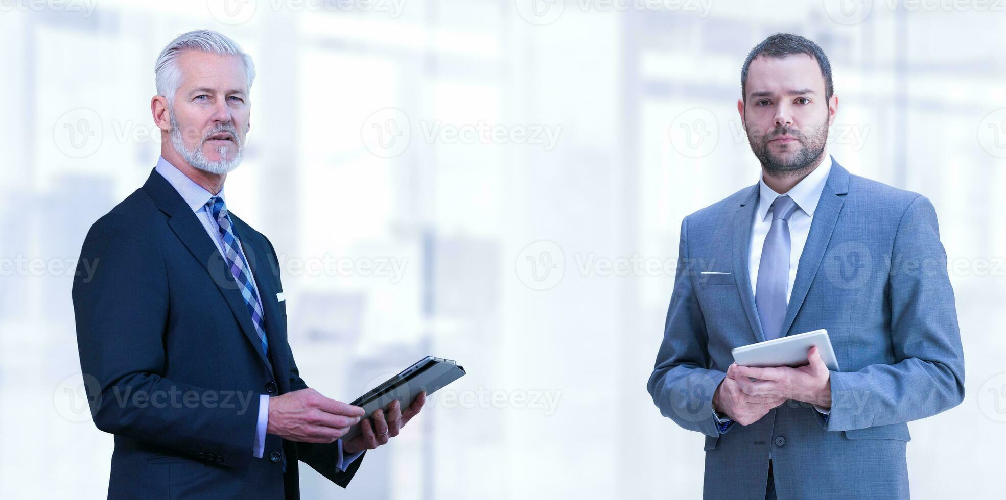 Portrait of two colleague businessmans photo