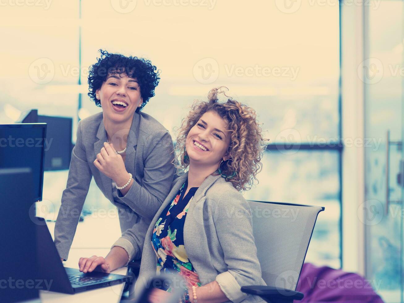 young female software developers at office photo