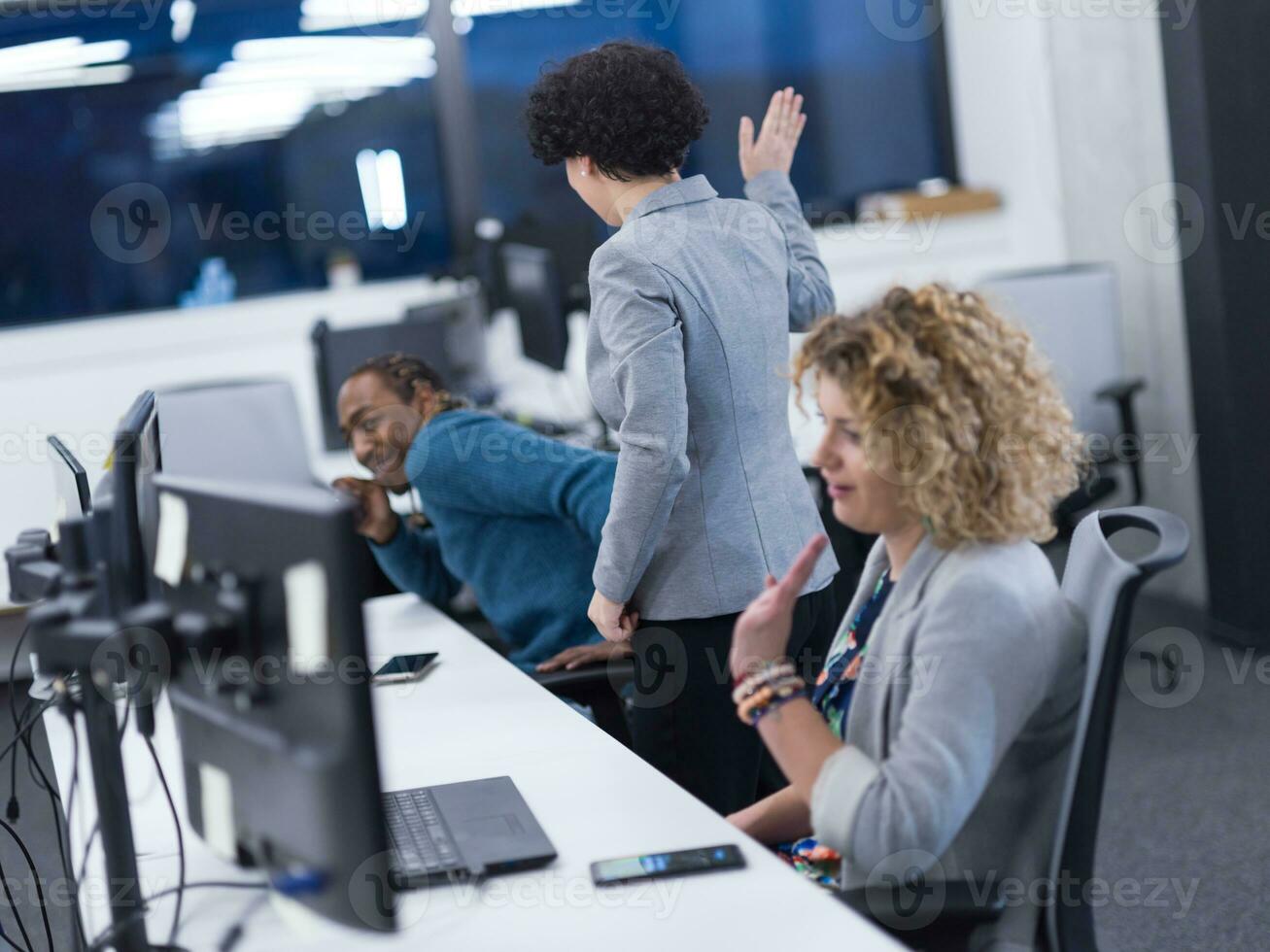 multiethnics team of software developers working together photo