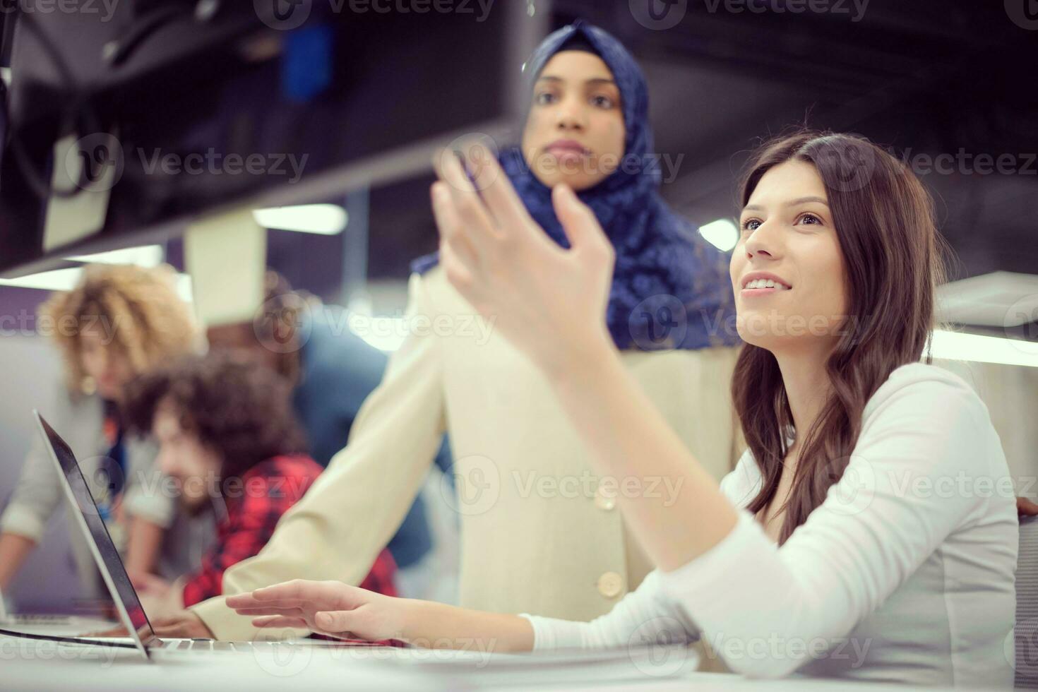 multiethnics team of software developers working together photo