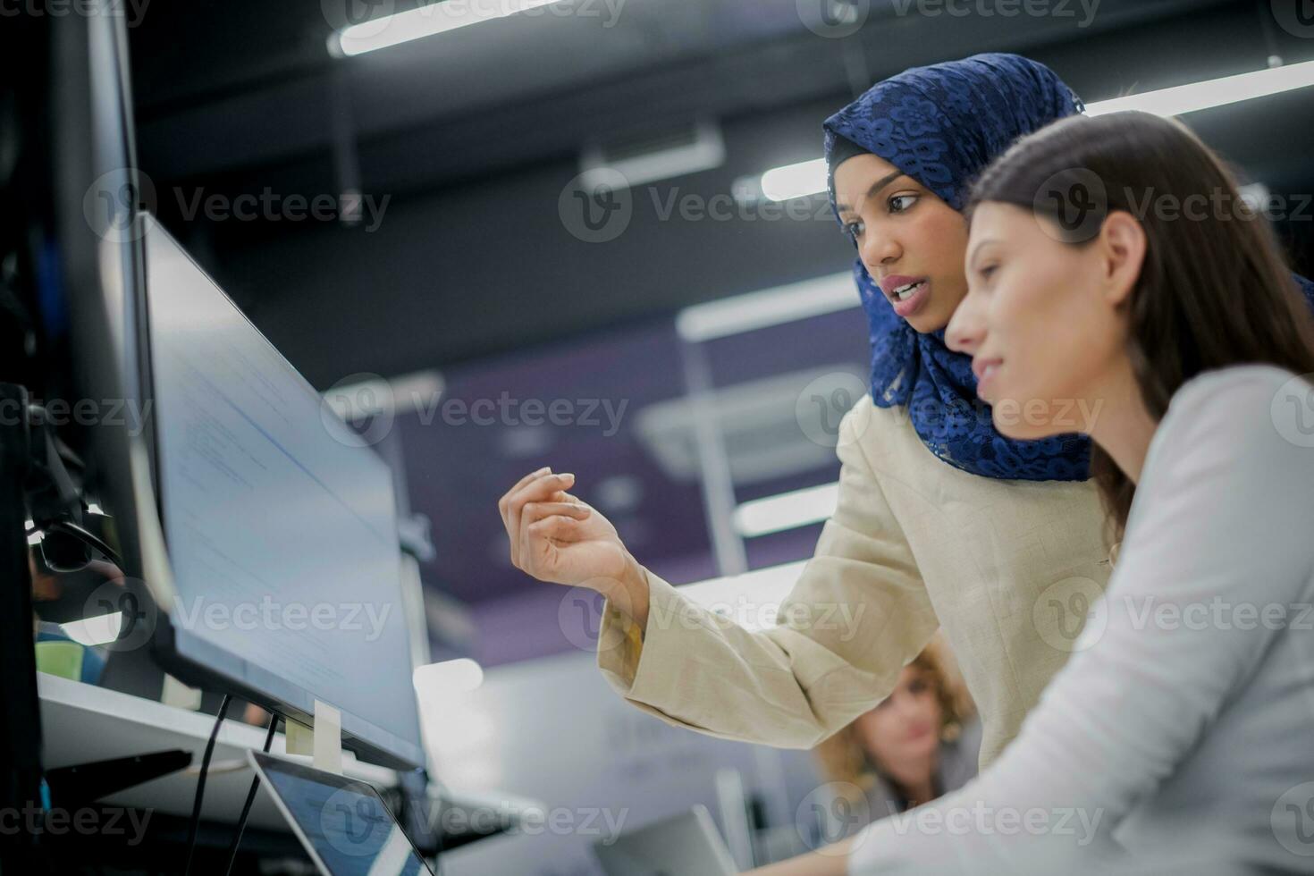 multiethnics team of software developers working together photo
