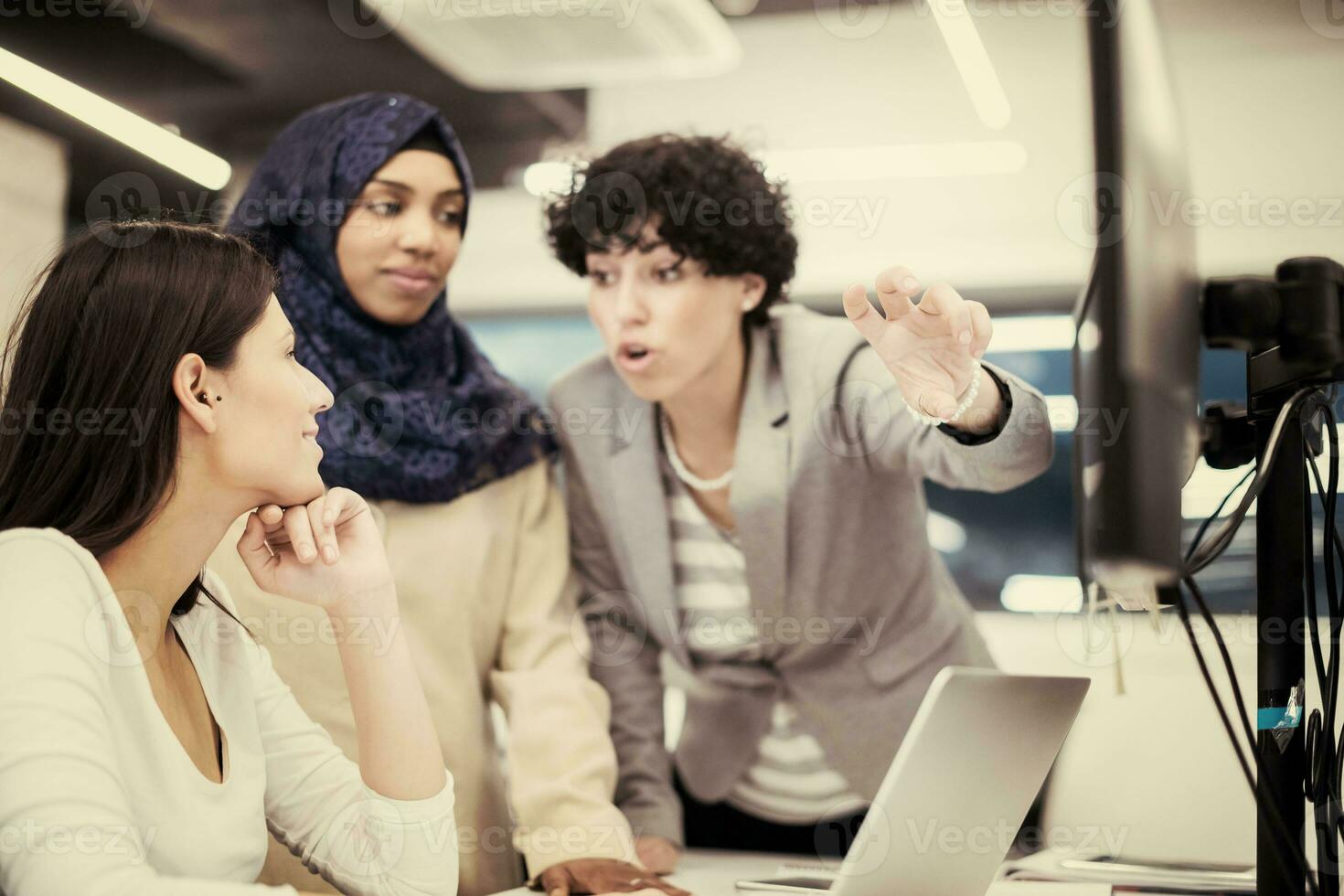 multiethnics team of software developers working together photo