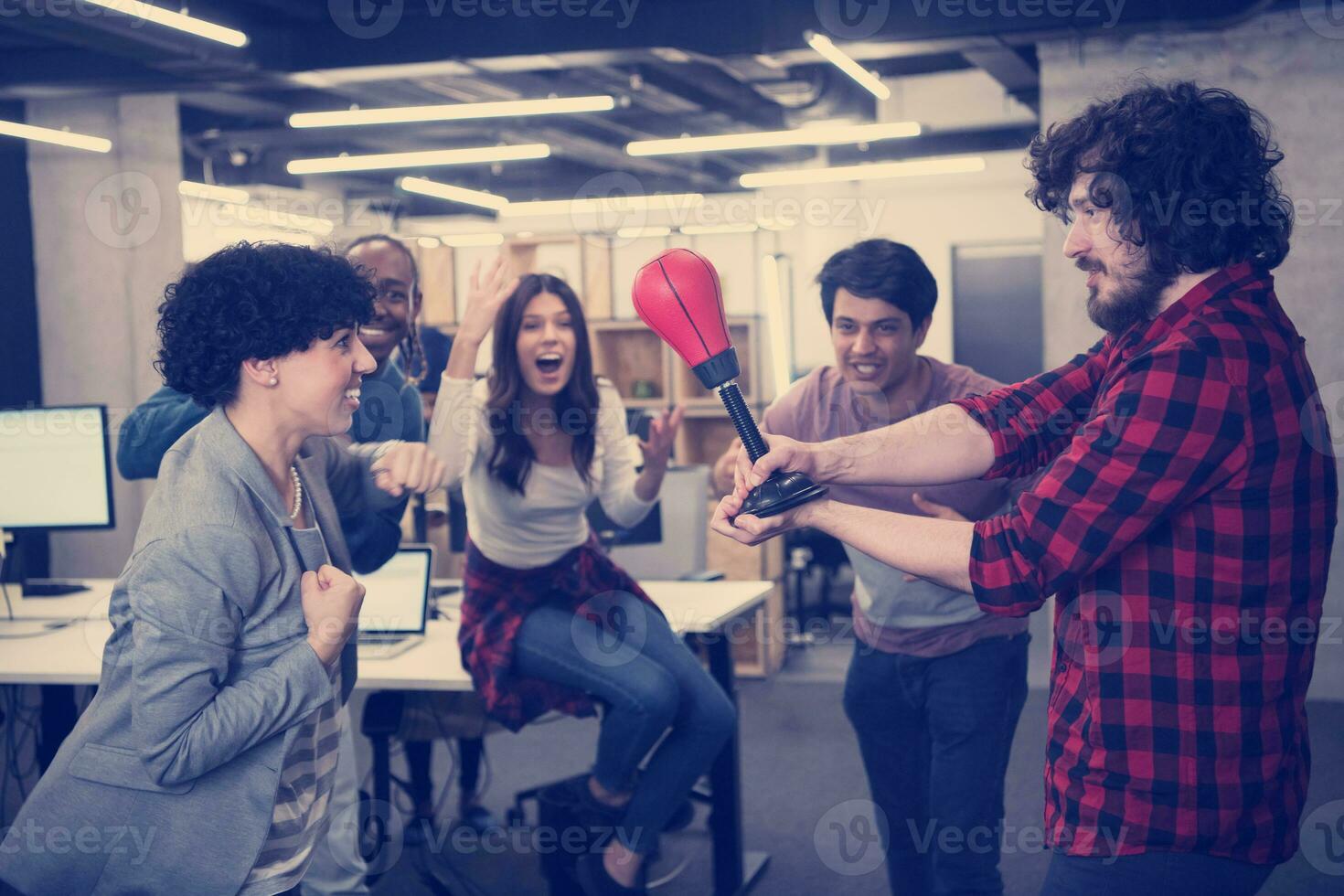 multiethnics business team boxing at office photo