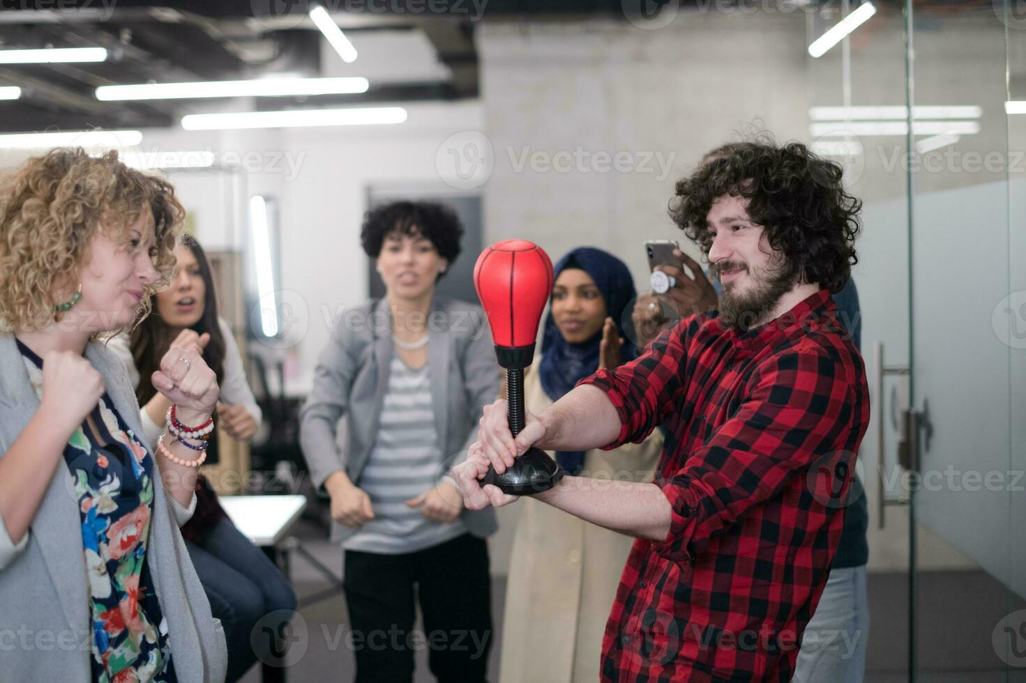 multiethnics business team boxing at office photo