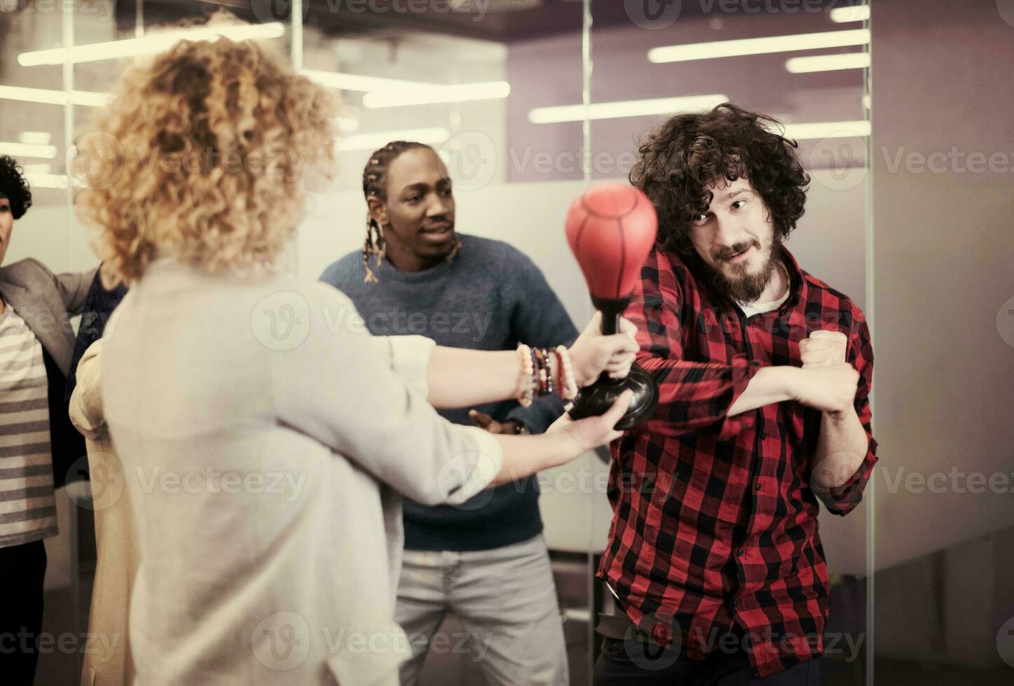 multiethnics business team boxing at office photo