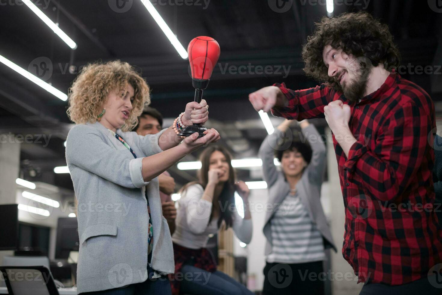 multiethnics business team boxing at office photo