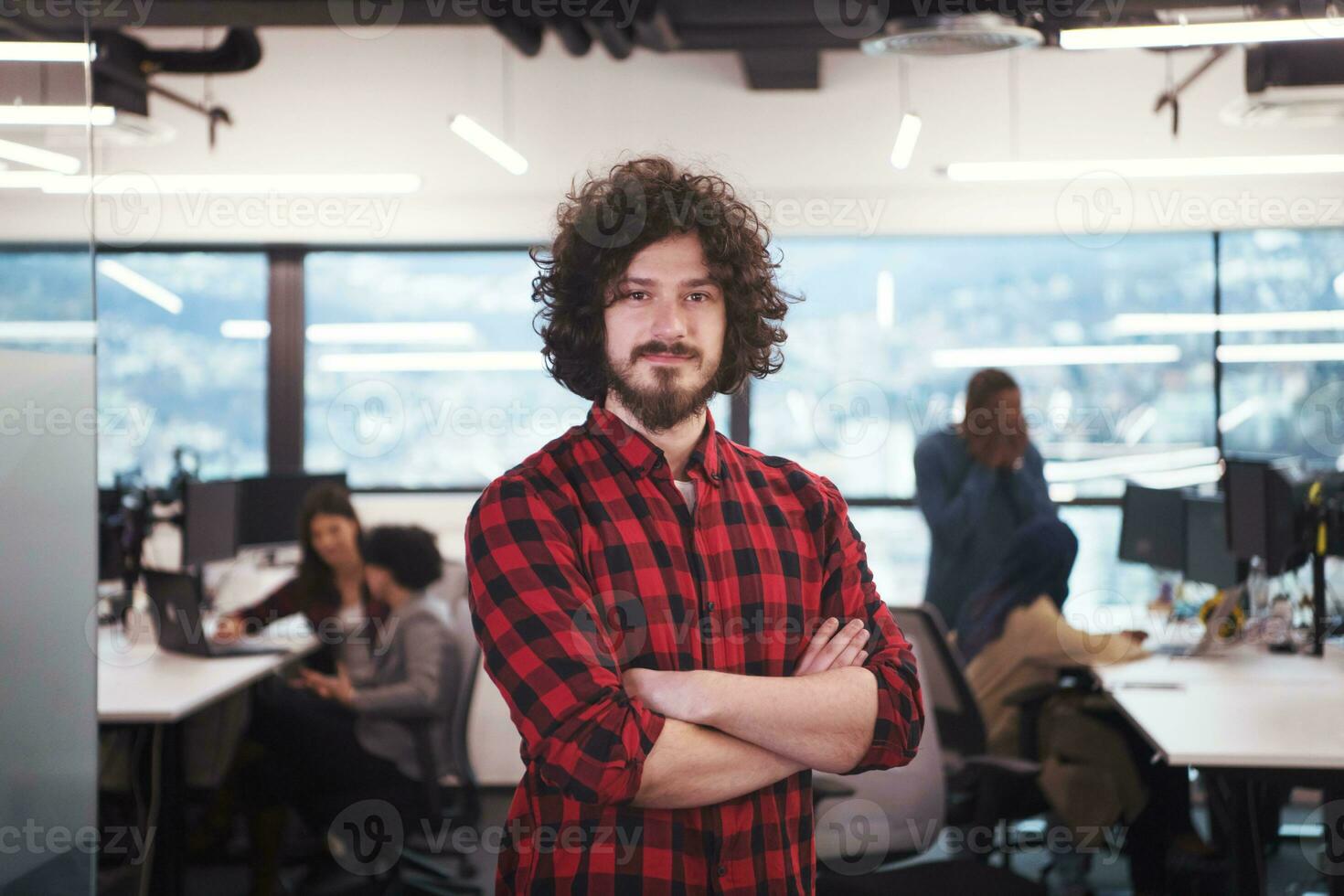 Portrait of smiling male software developer photo