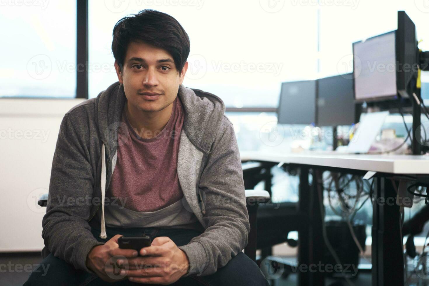 software developer using mobile phone photo
