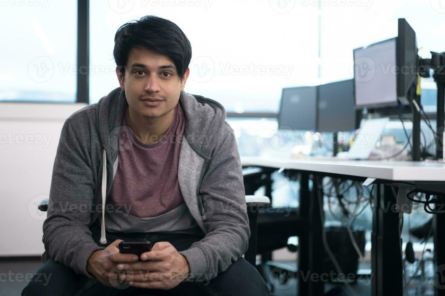 software developer using mobile phone photo