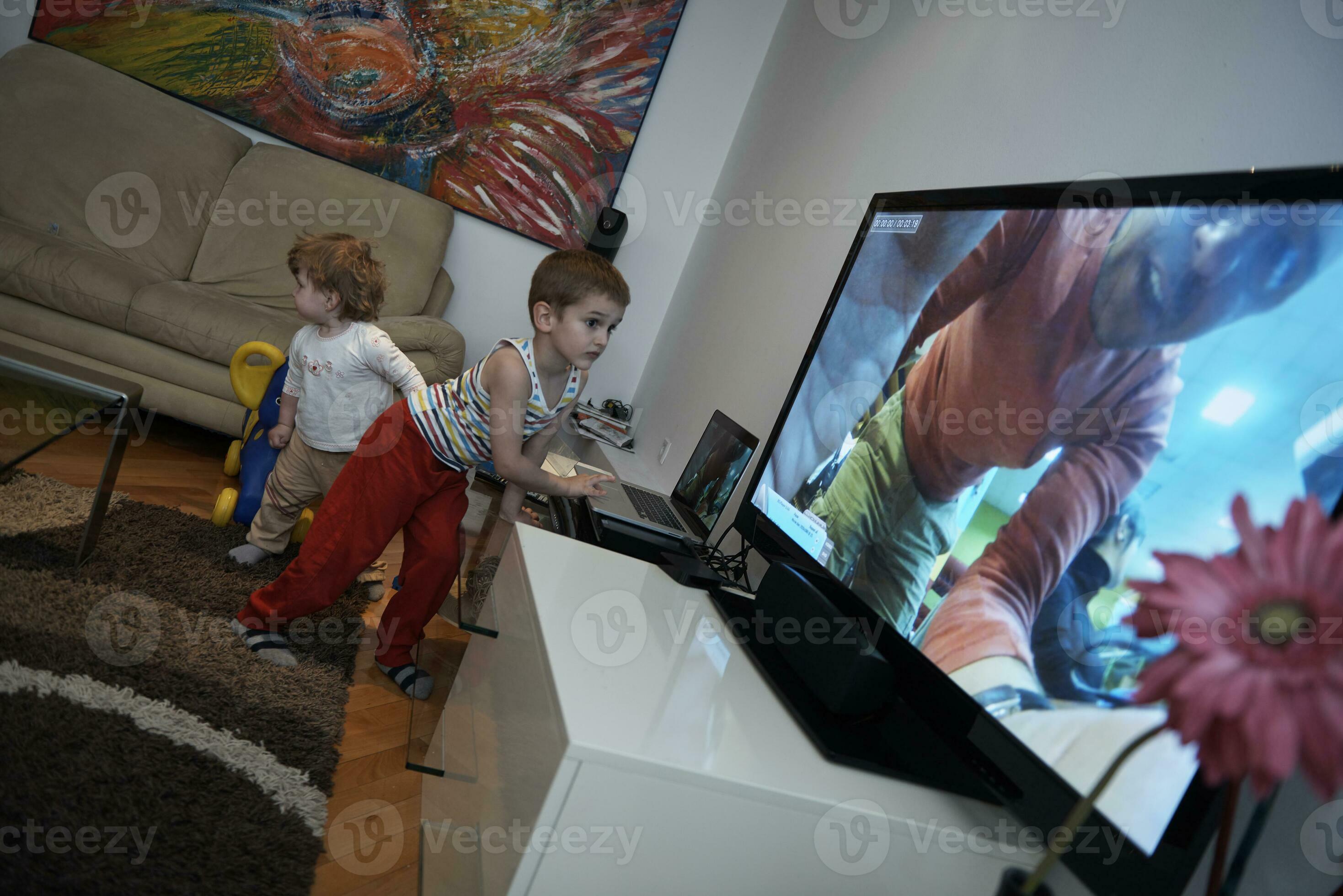 Little child playing with sister at home 31023340 Stock Photo at Vecteezy
