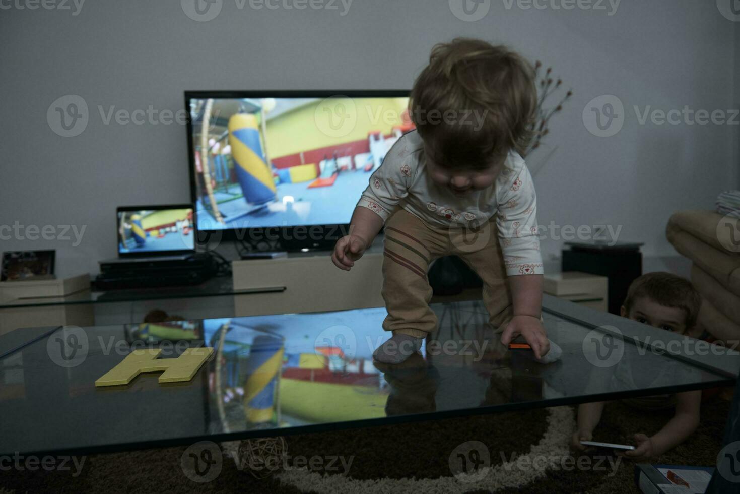 cute  little one year old baby and making first steps photo