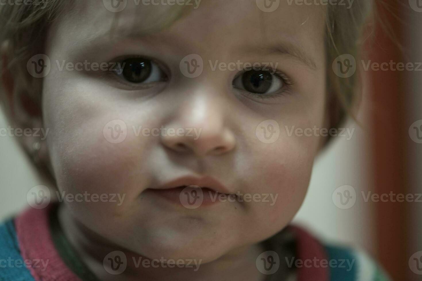 Closeup portrait of the one year old baby photo