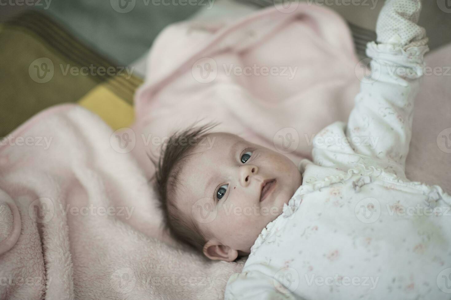 happy newborn little baby smilling photo