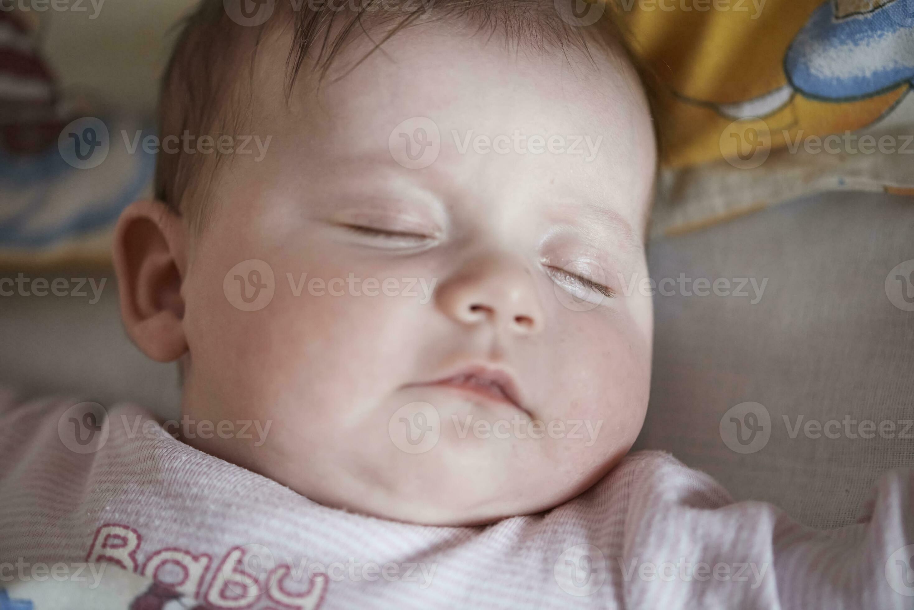 newborn baby sleeping at home in bed 31023499 Stock Photo at Vecteezy