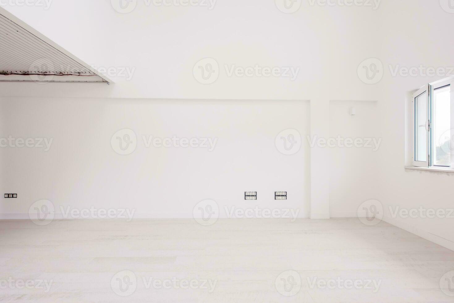 Interior of empty stylish modern open space two level apartment photo