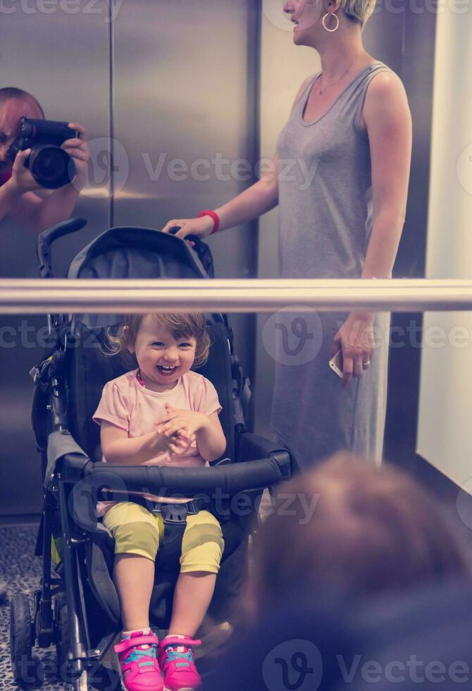 happy family in the elevator photo