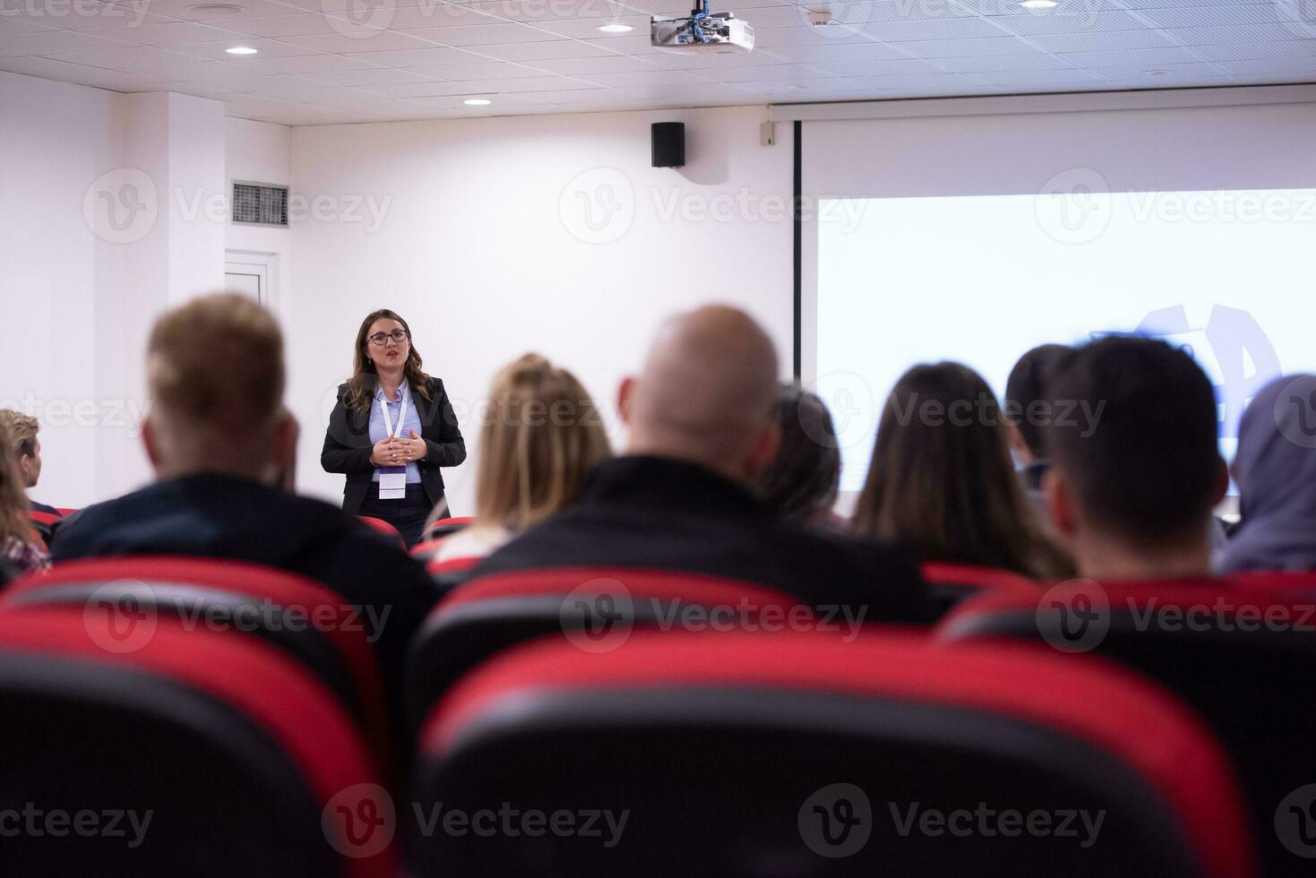 businesswoman giving presentations at conference room photo