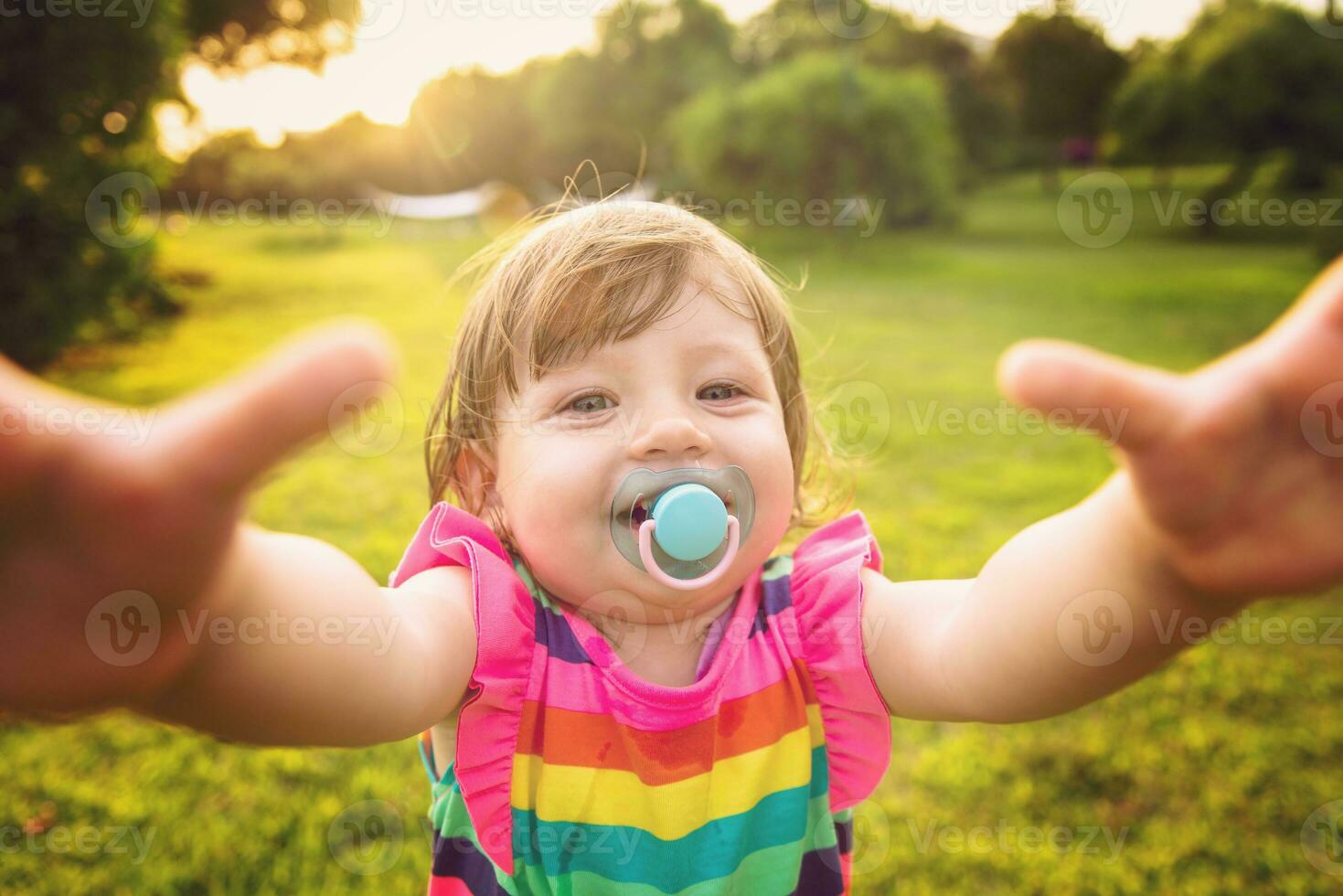 little girl spending time at backyard photo