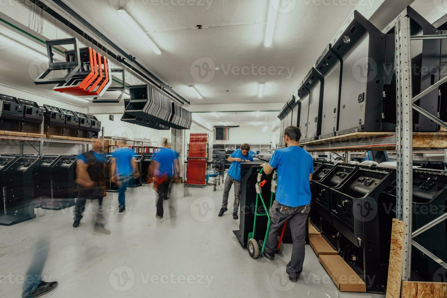 Blurred movement of workers in modern heavy industry while doing the jobs they are in charge of. Blurred photo. Selective focus photo