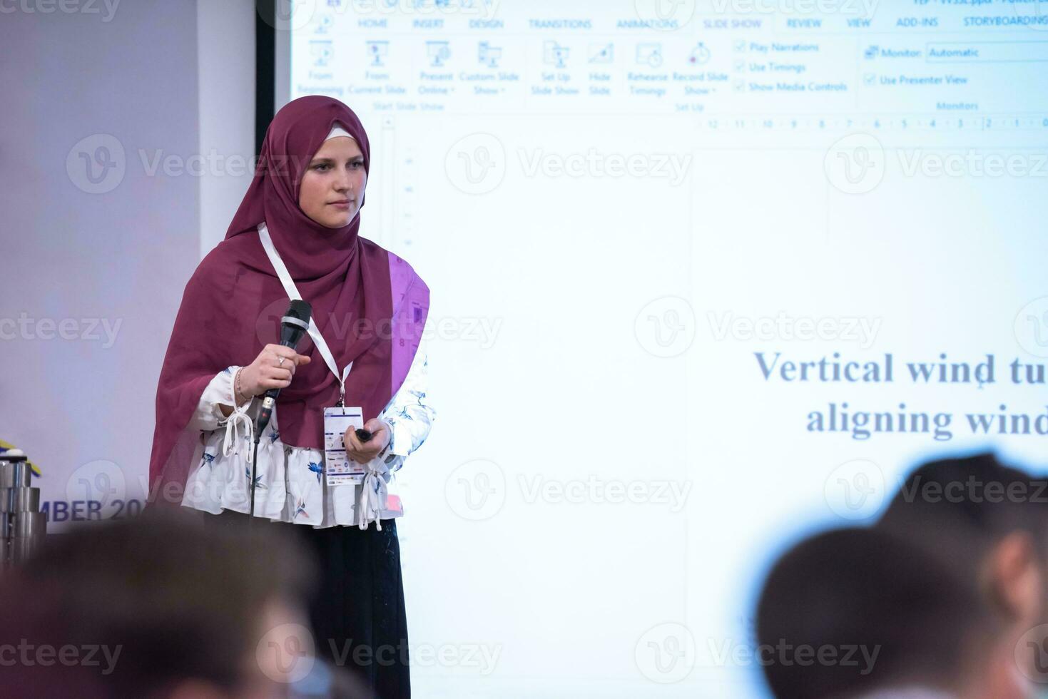 Muslim businesswoman giving presentations at conference room photo