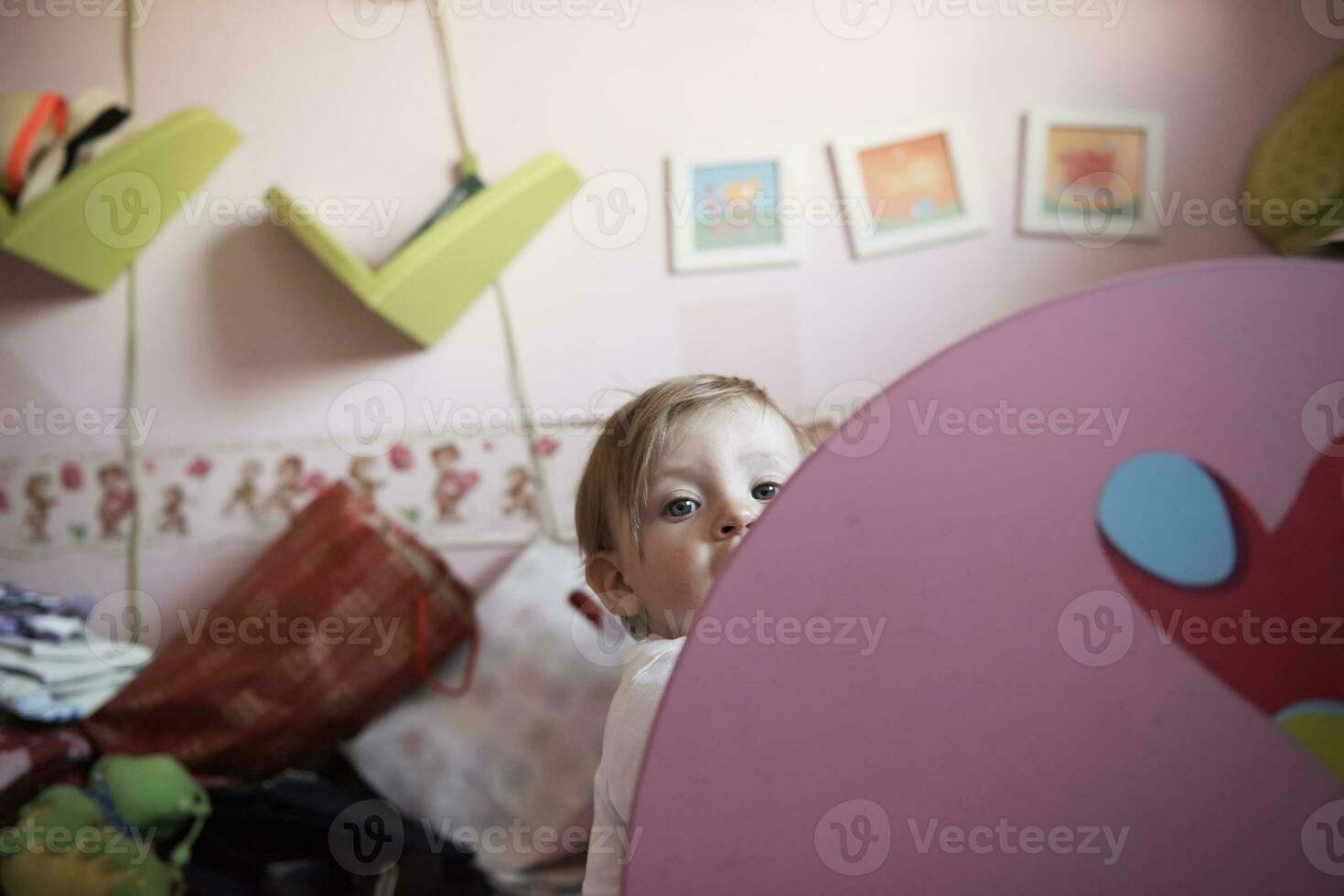 cute  little one year old baby and making first steps photo