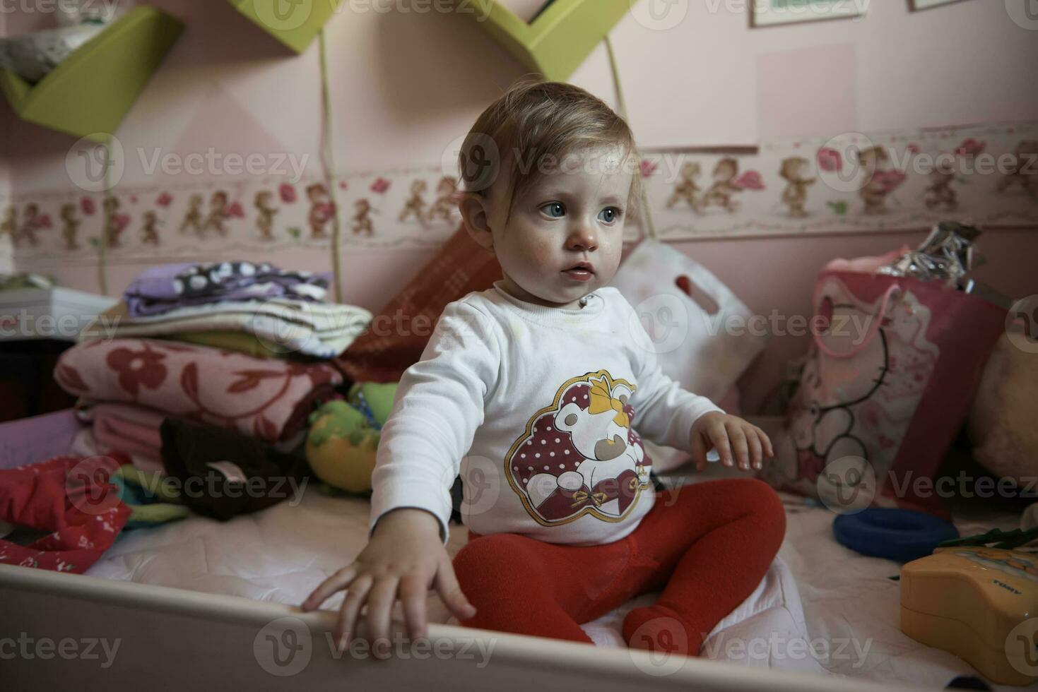 cute  little one year old baby and making first steps photo