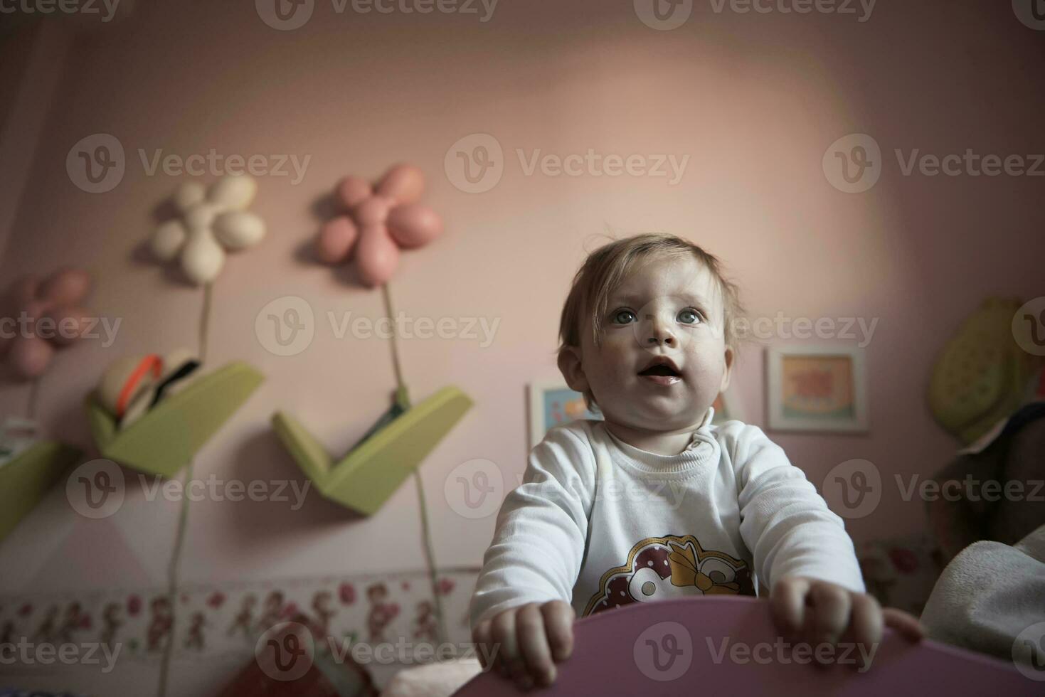 cute  little one year old baby and making first steps photo