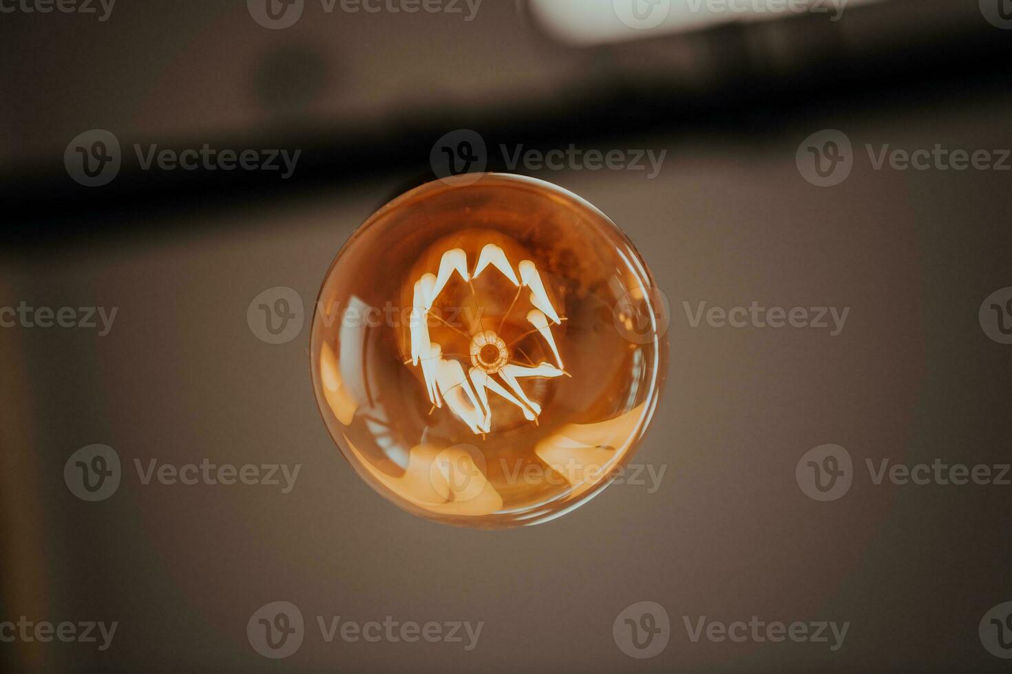 Light bulb illuminated and taken from above photo