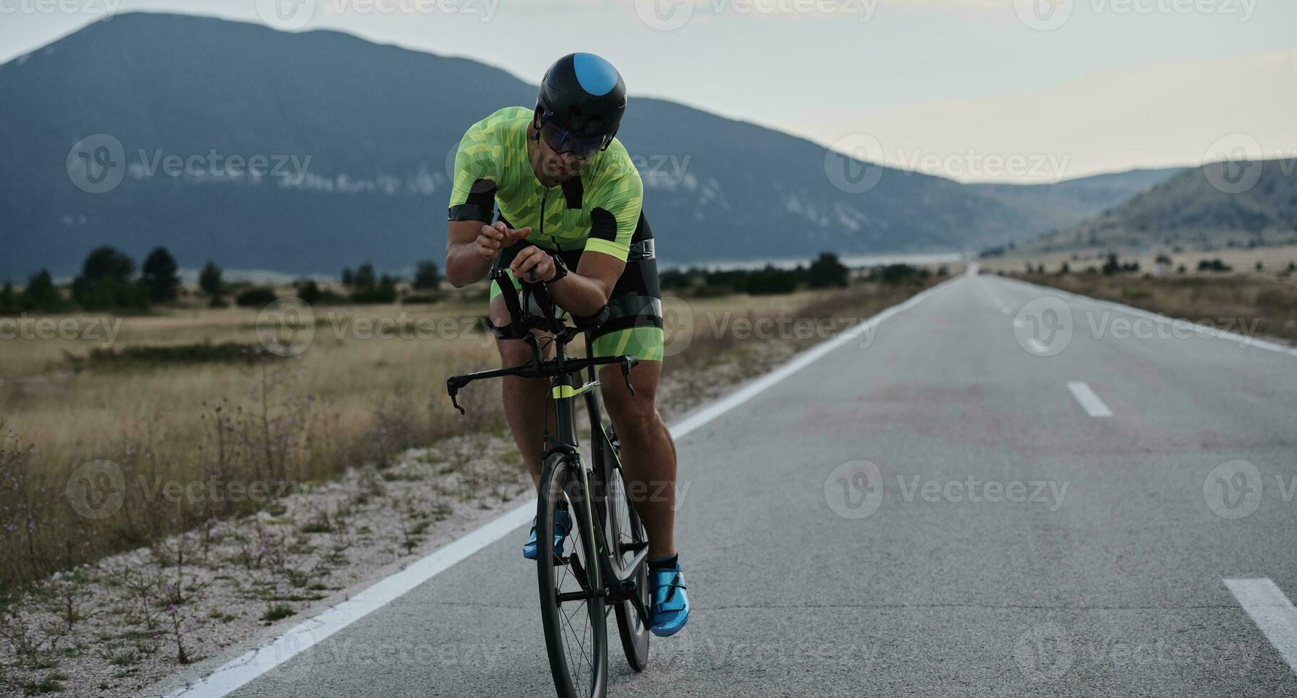 triathlon athlete riding bike photo